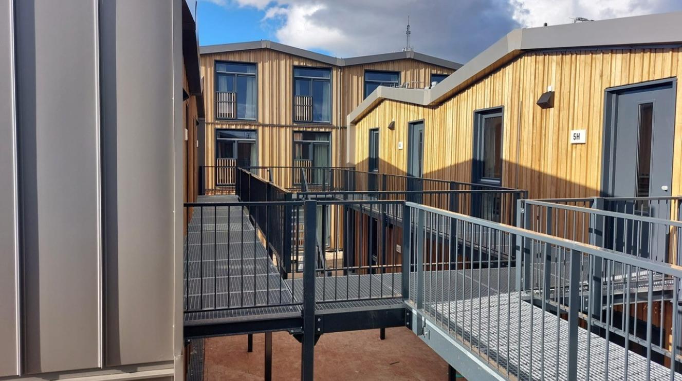 de woningen